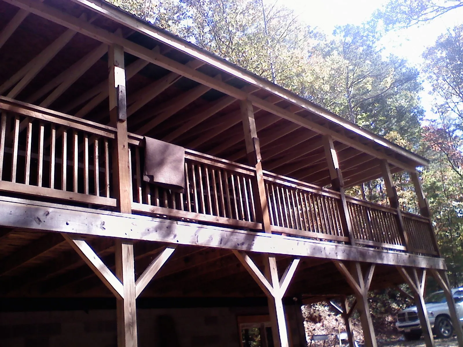 Timber framing under a new elevated porch and deck — Roof Leak Repair in Falkland by Roofing Brothers
